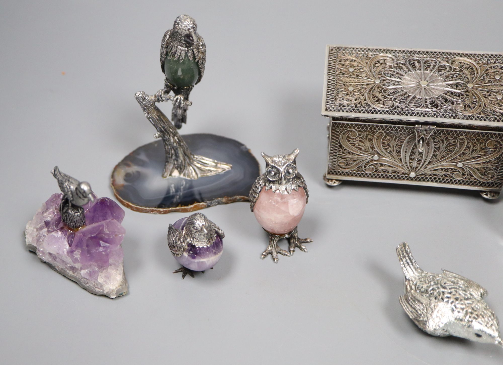 A group of small silver, plated and white metal items